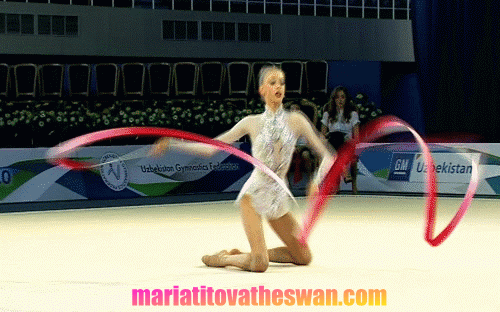 Masha-Ribbon-Ending Pose-Happy Caravan-Tashkent 2012-logo